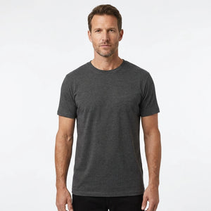 T-Time T-shirt, Koks grå 0510 | Studio portrait of a 45-year-old man, athletic build, short brown hair, light stubble, neutral confident expression, standing against a plain white seamless stu