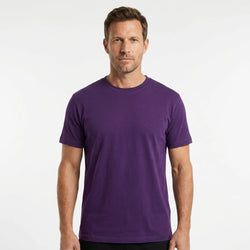 T-Time T-shirt, Lilla 0510 | Studio portrait of a 45-year-old man, athletic build, short brown hair, light stubble, neutral confident expression, standing against a plain white seamless stu