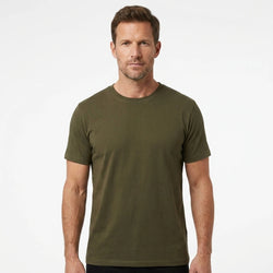 T-Time T-shirt, Oliven 0510 | Studio portrait of a 45-year-old man, athletic build, short brown hair, light stubble, neutral confident expression, standing against a plain white seamless stu