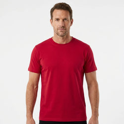 T-Time T-shirt, Rød 0510 | Studio portrait of a 45-year-old man, athletic build, short brown hair, light stubble, neutral confident expression, standing against a plain white seamless stu